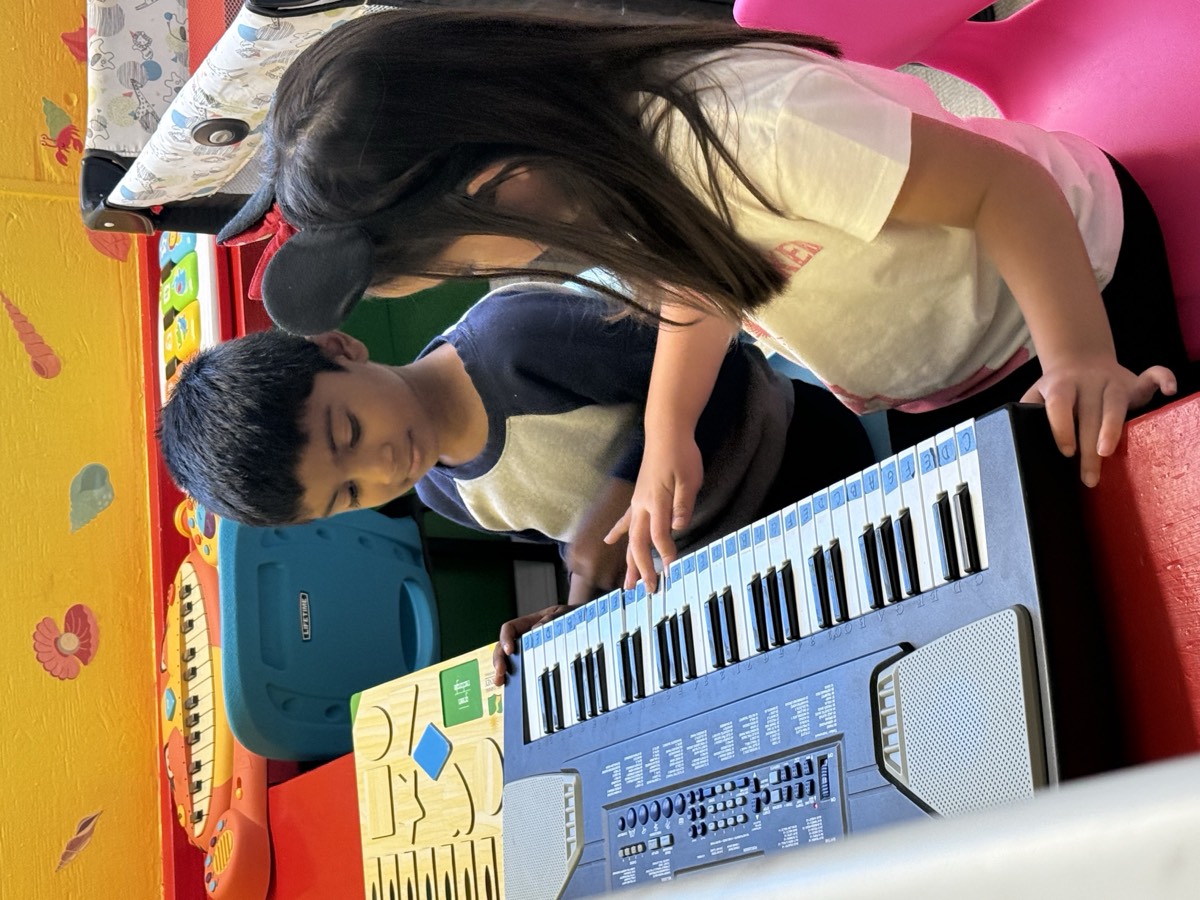 Children playing music together
